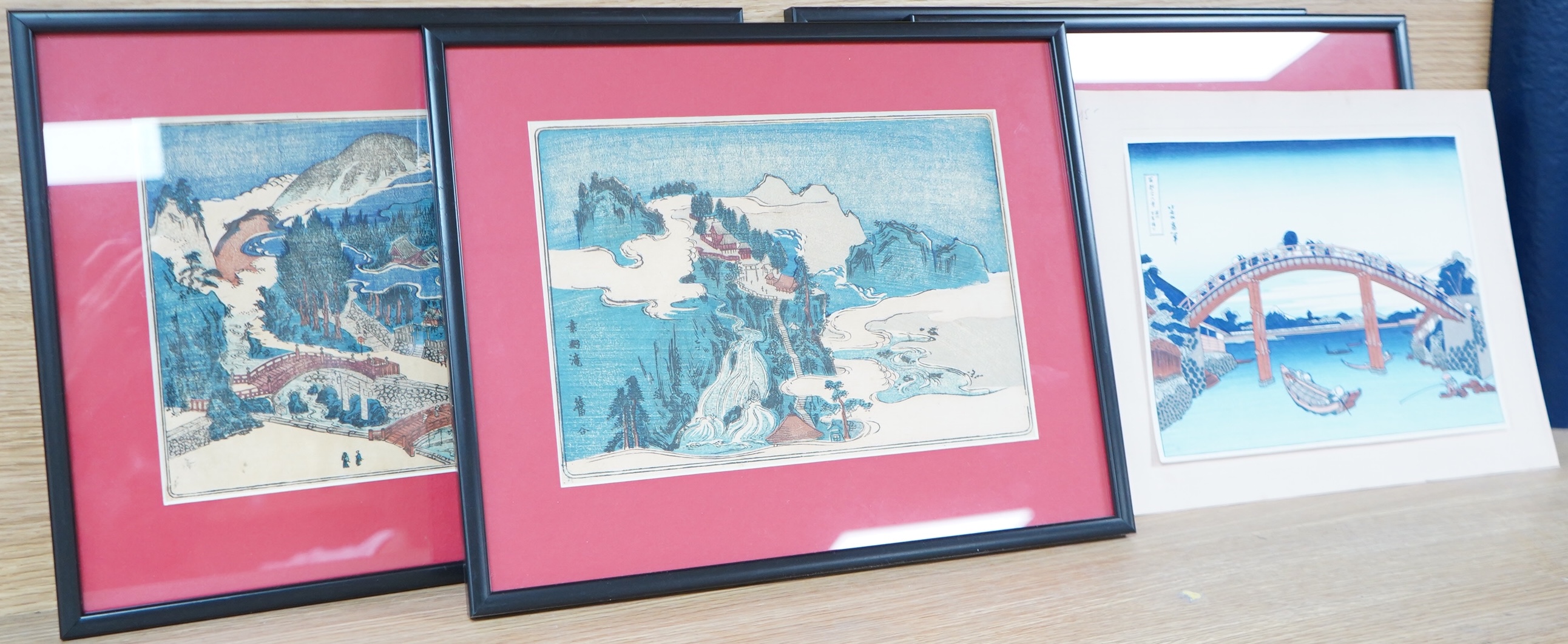 A set of four Japanese woodblock later reprints, Winter scenes, together with a later example, 18 x 25cm